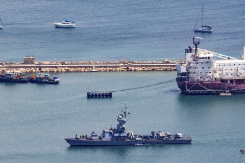 An Israeli Navy corvette patrols along the coast of the northern port city of Haifa