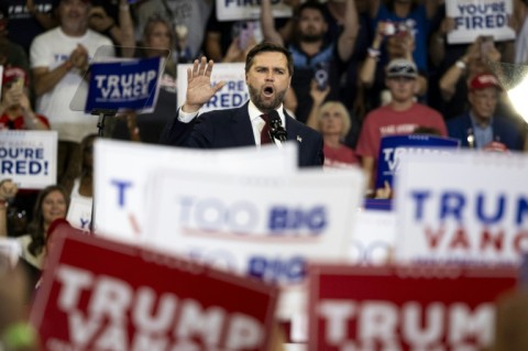 US Republican vice presidential candidate J.D. Vance speaks ahead of presidential nominee Donald Trump during a campaign rally in Atlanta, Georgia on August 3, 2024