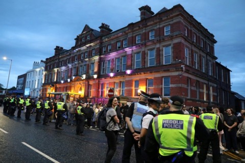 Liverpool residents showed solidarity with the Muslim community by turning up at a local mosque after reports far-right agitators planned to target it