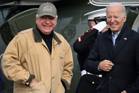 US President Joe Biden speaks with Minnesota Governor Tim Walz (L) in Walz's Midwestern state of Minnesota