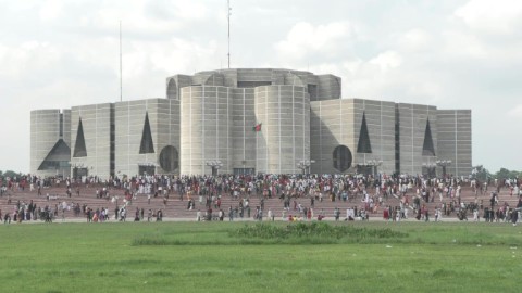 Thousands of people congregate at the Bangladeshi parliament in Dhaka to celebrate the resignation of Sheikh Hasina