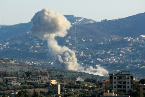 Smoke billows after an Israeli strike on the southern Lebanese village of Kfar Kila