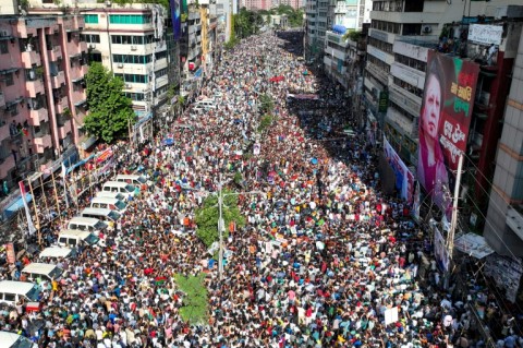 Tens of thousands of people, including opposition activists, filled thoroughfares in the capital on Wednesday