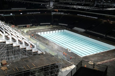 The temporary pool used for the swimming is set to be dug out and moved Paris Defense Arena