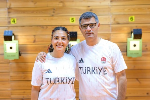 For the 51-year-old, the real prize was winning Turkey's first medal in the mixed-team 10m air pistol with teammate Sevval Ilayda Tarhan (L)