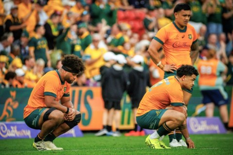 (From left) Rob Valetini, Hunter Paisami and Len Ikitau look dejected following Australia's Rugby Championship drubbing by South Africa, whose coach is expecting a Wallabies challenge in the rematch next weekend