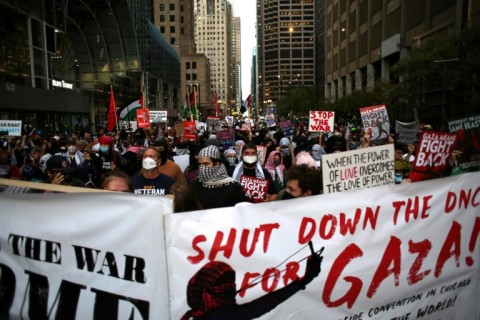 Protesters march outside the Israeli consulate during the Democratic National Convention on August 20, 2024 in Chicago, Illinois