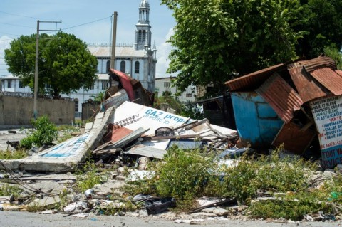 The remains of a building destroyed by gangs is seen during a Kenyan police deployment near the national palace in Port-au-Prince, Haiti on July 17, 2024