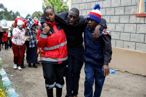 Distraught relatives were taken to the burnt-out dormitory 