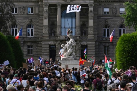 Thousands of left-wing demonstrators marched across France on Saturday