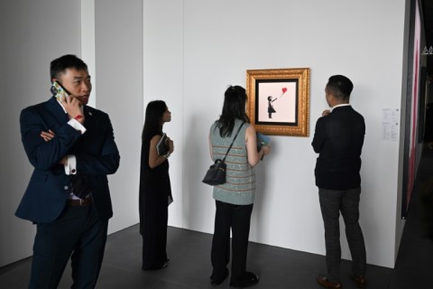 Christie's high-profile auction on Thursday featured nearly 50 masterpieces from the 20th and 21th centuries, including work by street artist Banksy