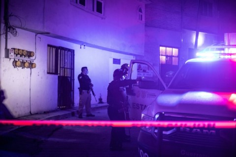 Investigators work at the site where the remains of Chilpancingo Mayor Alejandro Arcos was found in Mexico's southern state of Guerrero