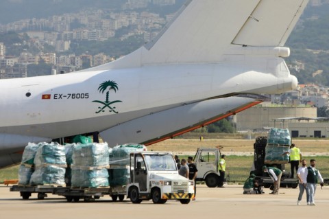 Aid provided for Lebanon by Saudi Arabia is unloaded on the tarmac at Beirut International Airport