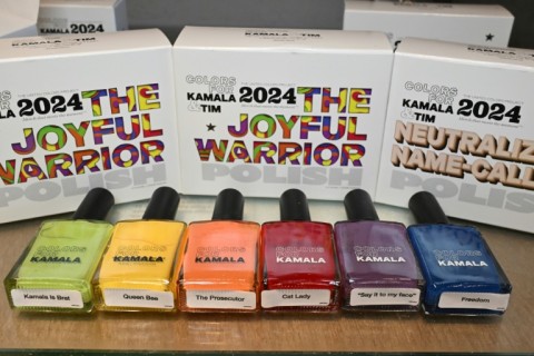 Nail polishes from 'The Joyful Warrior' set include a green called 'Kamala Is Brat,' an orange called 'The Prosecutor' and a classic red dubbed 'Cat Lady'