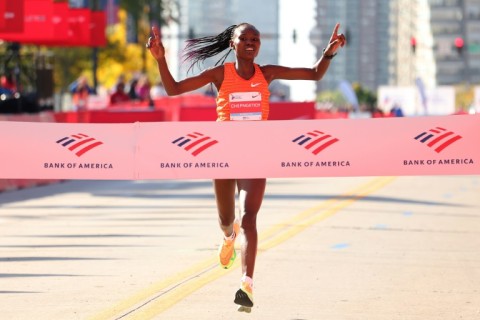 Ruth Chepngetich set a women's world record as she won the Chicago Marathon for a third time