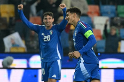 Captain Giovanni Di Lorenzo (R) scored twice in Italy's 4-1 win against Israel