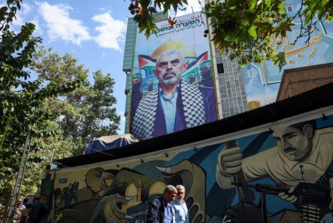 A billboard bearing a portrait of Hamas's slain leader Yahya Sinwar is seen in Tehran