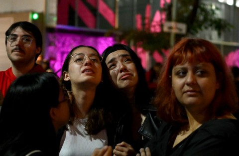 Fans of Payne gathered at the hotel where he fell to his death
