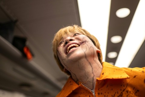 An actor performs during the 'Zombie Shinkansen' event on a bullet train from Tokyo to Osaka ahead of Halloween