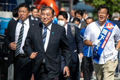 Prime Minister Shigeru Ishiba (2nd from left) became premier on October 1, and called snap elections days later