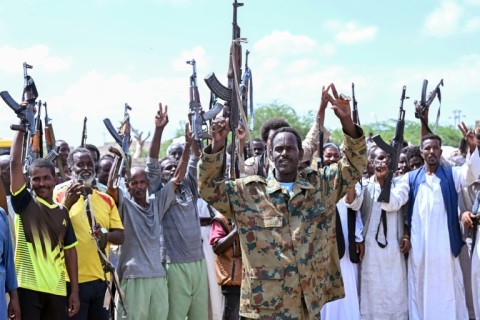 Members of Sudan's security forces take part in the opening ceremony of a headquarters facility in army-controlled Port Sudan