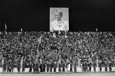 An estimated 60,000 people filled the stadium in Kinshasa with a portrait of Zaire president Mobutu Sese Seko looking down 