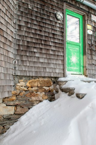 The Zittel hut's crumbling foundations and its weather-worn wooden shingles are in need of urgent repair