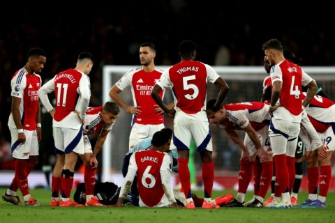 Arsenal are five points behind Premier League leaders Manchester City