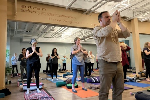 People participate in a yoga and meditation event days before America's divisive presidential election