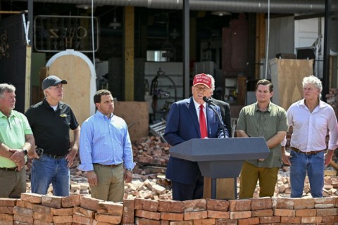 Former US president Donald Trump spoke outside a flood-ravaged store in Valdosta, Georgia, making a stop in the southeastern swing state after storm Helene caused devastation across parts of the region