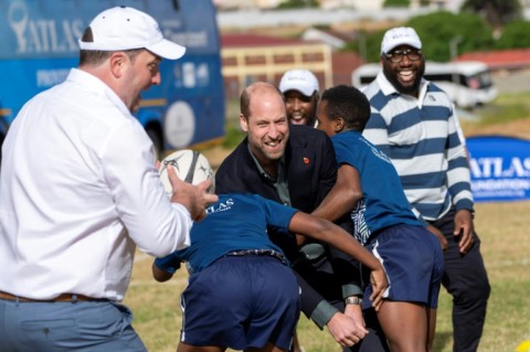 William took tackles from children at a school in an underprivileged Cape Town township