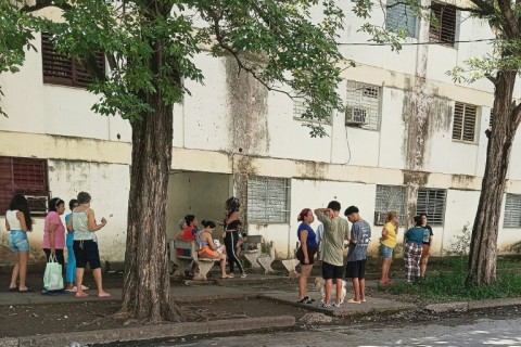 Residents stood outside their buildings after the earthquakes 