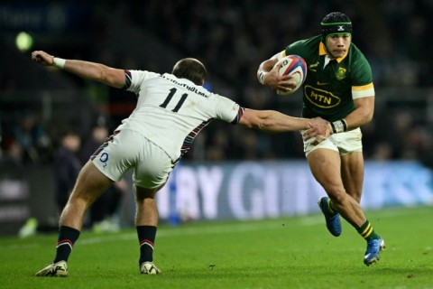 Show and go: South Africa wing Cheslin Kolbe (R) side-steps Ollie Sleightholme to score the first of his two tries in a 29-20 win over England at Twickenham 