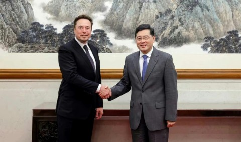 Musk on a trip to Beijing last year where he met then foreign minister Qin Gang 