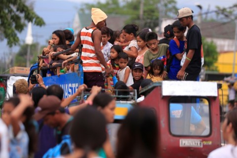 Typhoon Man-yi continues to displace Filipinos impacted by an unusual streak of violent weather