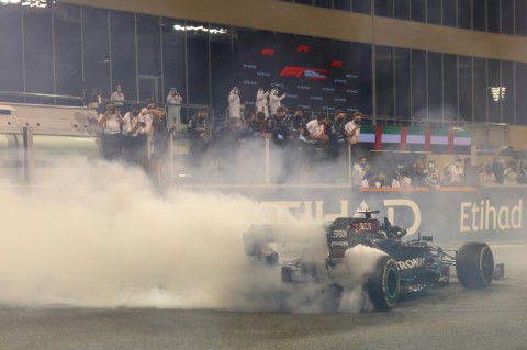 Lewis Hamilton does doughnuts after the Covid-19 affected season closer in Abu Dhabi - his seventh world title