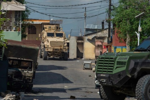 A Kenyan police armored vehicle patrols the Solino district in Port-au-Prince on November 16, 2024