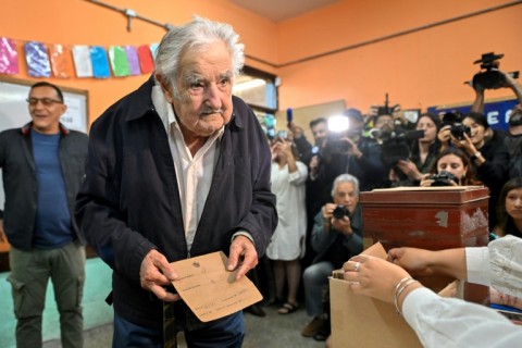 Uruguay's former President (2010-2015) Jose Mujica is battling cancer but used a cane to walk into this polling station to vote on Sunday  