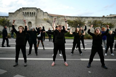 Protesters perform a haka during a demonstration organised by the "Les Amazones d'Avignon" feminist collective in support of Gisele Pelicot near the Avignon courthouse 