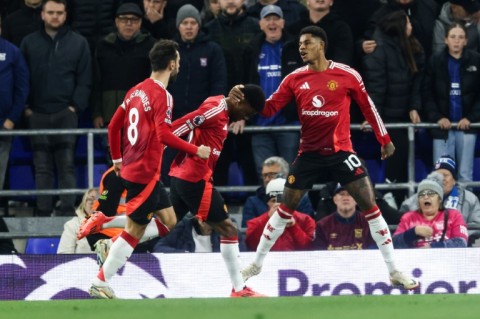 Manchester United's players celebrate after Marcus Rashford's goal against Ipswich