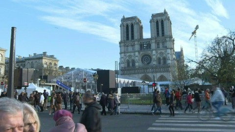 Onlookers flock to Notre-Dame Cathedral on eve of reopening