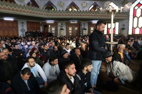 Syrian Muslims pray at a mosque in the northern city of Aleppo after its capture by Islamist-led rebels