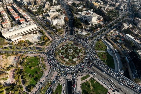 This aerial view shows traffic at Damascus's central Umayyad Square