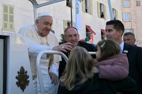 Francis blessed several children brought to his popemobile