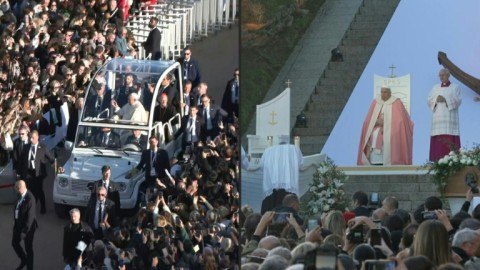 Pope Francis greets the crowd before celebrating mass in Ajaccio