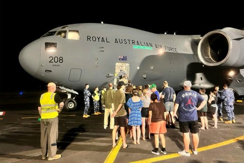 An Australian air force transport plane carries Australians out of earthquake-devastated Vanuatu