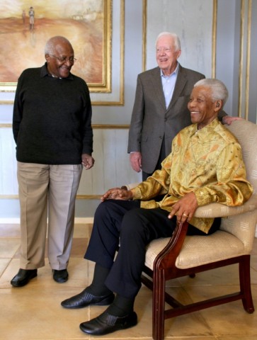 Carter belonged to a group called The Elders that included with fellow Nobel laureates Archbishop Desmond Tutu of South Africa (L) and former South African president Nelson Mandela (seated), pictured here in 2010