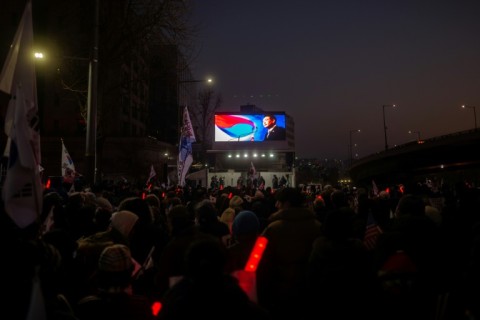 A portrait of impeached South Korean President Yoon Suk Yeol is seen at a rally to support him