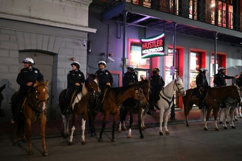 Mounted police monitor Bourbon Street in New Orleans on January 2, 2025