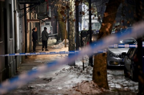 Police sealed off the area surrounding the restaurant where the first four victims were killed